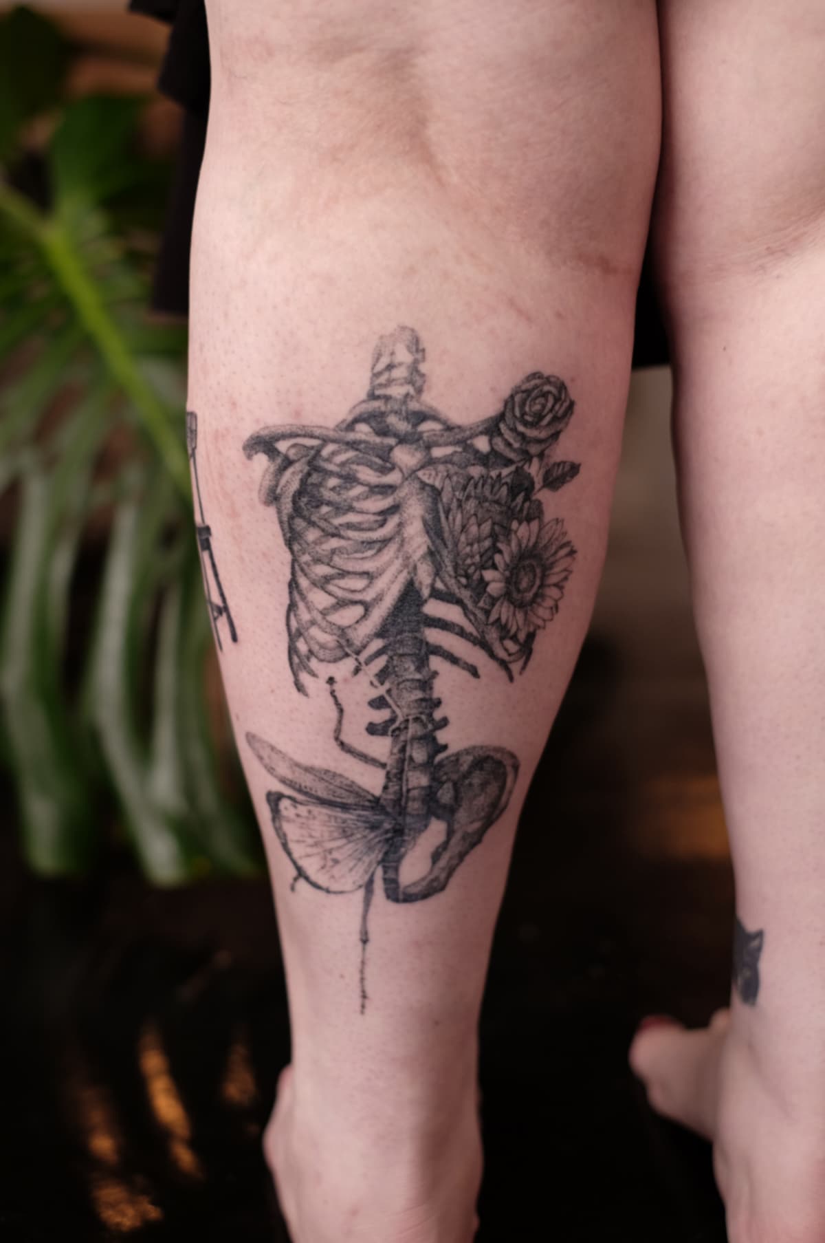 Healed tattoo by Jak Rapmund - calf Healed skele